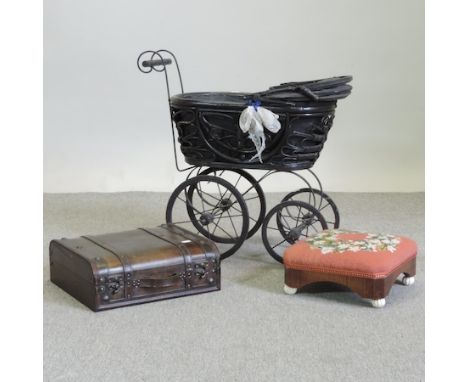 A dolls pram together with a mahogany and tapestry upholstered foot stool and wine case 