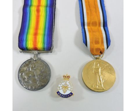 A World War I medal, together with another, Lance Corporal J. Rolfe, Rifle Brigade, 48948, and a veteran enamel badge, boxed