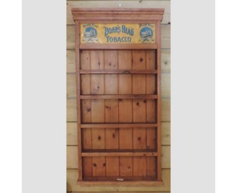 A pine advertising Boar's Head tobacco shop display shelf, 56cm