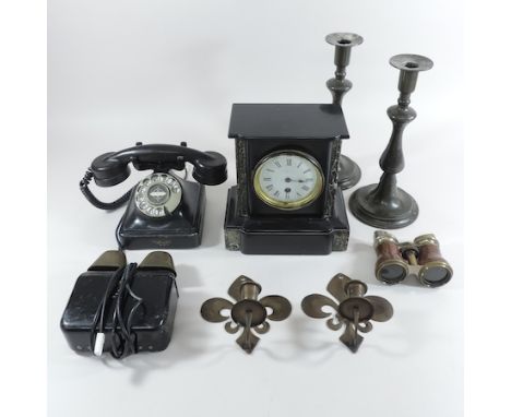 A Victorian black slate mantle clock, together with a pair of candlesticks, a bakelite telephone and a pair of wall sconces