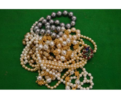 Various pearl necklaces.