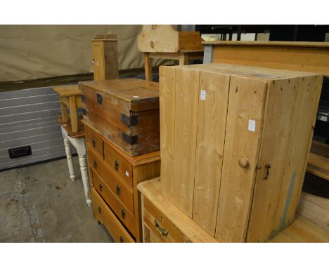 Two pine cupboards, a trunk and a coffee table.