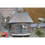 A large cast iron log burner.