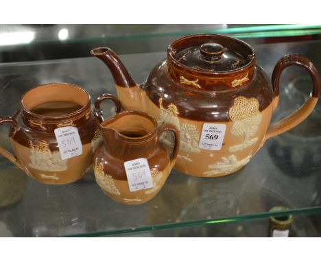 A Doulton salt glazed three piece tea service.