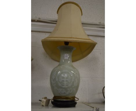 A Chinese vase lamp.