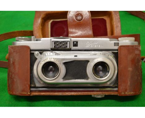 An Edixa stereo camera with leather case.