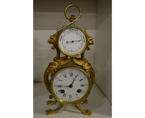 A gilt metal combination clock barometer.