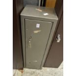 A small gun cabinet.