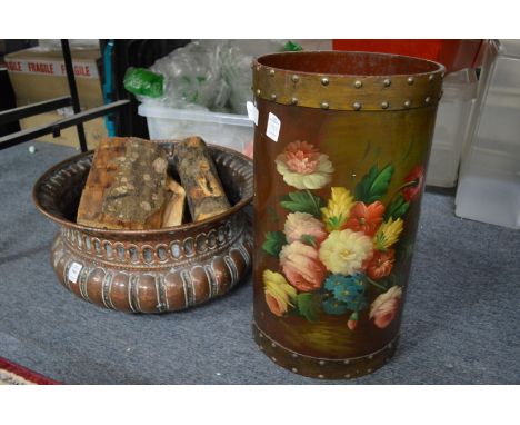 A good Eastern copper jardiniere and a decorative stick stand.