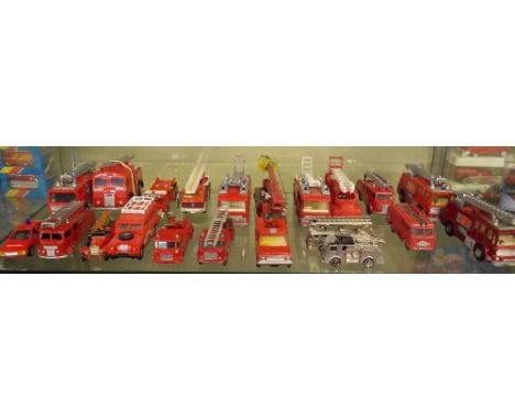 SHELF OF UNBOXED DIECAST MODELS OF FIE ENGINES AND RELATED VEHICLES BY CORGI, MATCHBOX, DINKY AND INC TWO MINIATURE FIRE ENGI