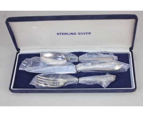 An Elizabeth II silver cased christening set of knife, fork and spoon, maker Harrison Brothers & Howson Ltd, Sheffield 2000