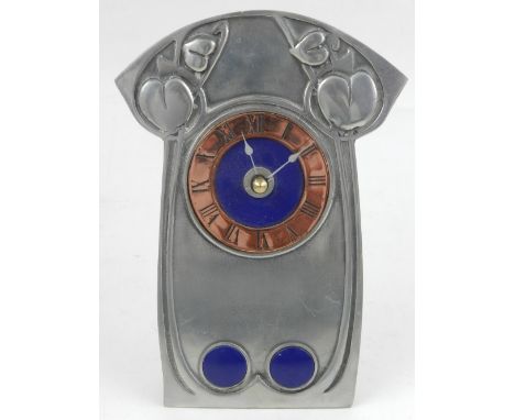 In the Arts and Crafts style, a pewter mantle clock, having copper dial. H: 18cm 