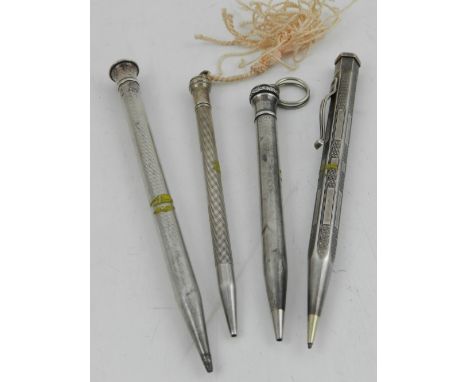 Three sterling silver ball point pens, together with one silver plated ball point pen. 