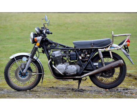   Motor Bike, Honda 750 Four, blue chassis. Registration number NPJ 10R.  Comes with together with a Haynes Honda Owners Work