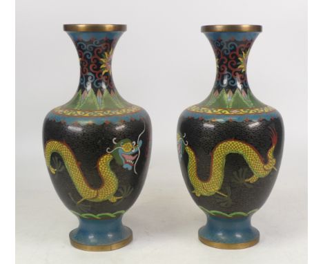 Pair of Chinese Oriental Cloisonne Vases. Images of four toed dragons. Some damage/dents to enamel. Height: 25.5cm (2)