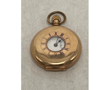 Dennison Star Gold Plated Half Hunter Pocket Watch. some scratching to opening of back and inner backplate.