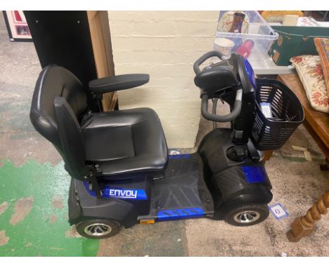 Envoy Electric Mobility Scooter together with Charger. Not driven tested but looks to be in good condition and in working ord