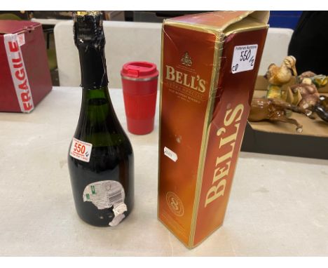 A bottle of Bells Extra Special 8 Year Whisky and a 2000 Vintage Cava (2)