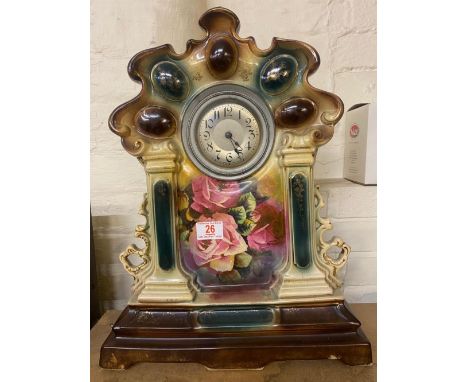 An ornate Pottery mantle clock 46cm H x 35cm W x 17cm D