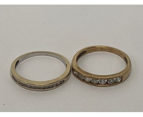 Two 9ct ladies half eternity rings, each set with CZ stones, size K-L,2.8g.