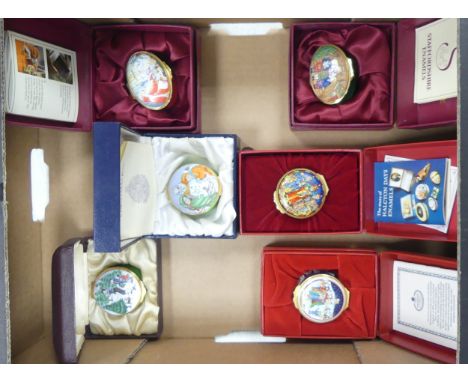 A Collection of Six Boxed Enamel Christmas Pillboxes including examples from Crummels, Fine Birmingham Enamels, Staffordshire