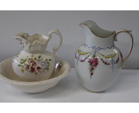 A ironstone jug &amp; basin set &amp; one other jug 