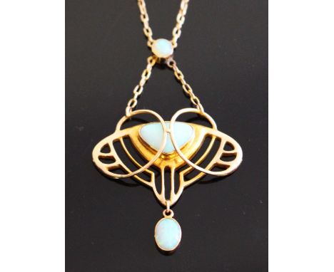 Barnet Henry Joseph, an Art Nouveau 9 carat gold and opal pendant on chain, circa 1900, sinuous pierced wing design, with ova