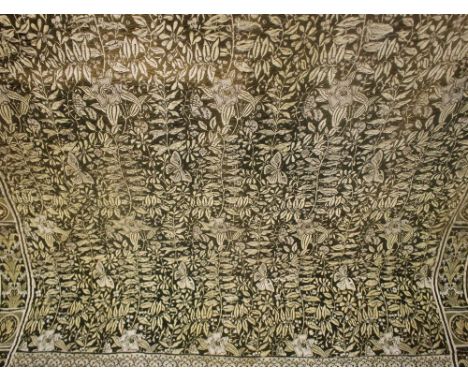 An Arts and Crafts green and ochre ground tapestry, in the Aesthetic style, circa 1880, woven with lilies and butterflies, bo