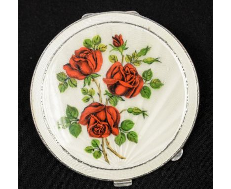 A 1950s silver and enamel compact, white guilloche with roses to the centre, Henry Clifford Davis, Birmingham 1951, 8cm diame