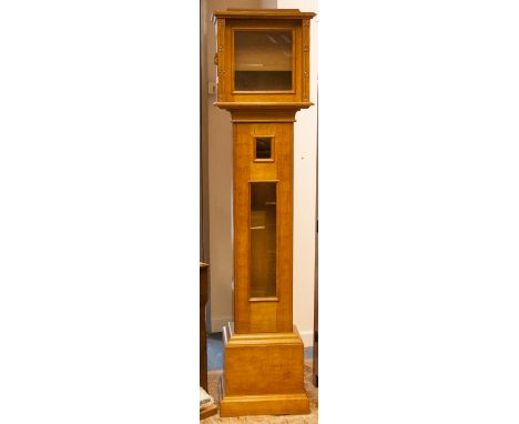 Robert (Mouseman) Thompson of Kilburn, a carved oak longcase clock, circa 1950, of rectangular section, with two light, glaze