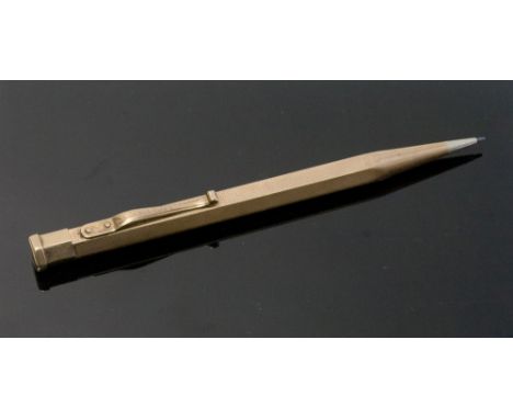 An Art Deco 9 carat gold Yard-o-Led propelling pencil, hexagonal section with engine turned decoration, marked and dated 1935