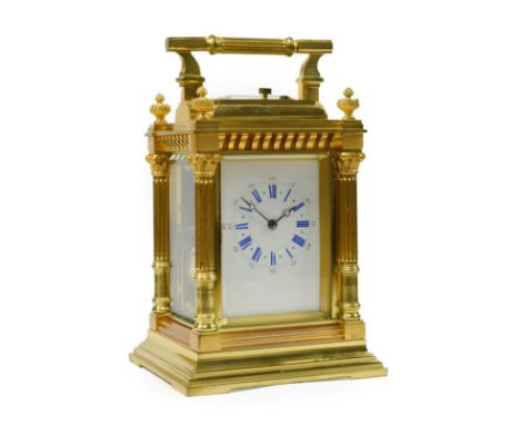 &lt;&gt; A Brass Striking and Repeating Carriage Clock, circa 1890, carrying handle and repeat button, Corinthian capped colu