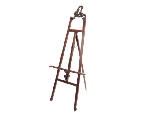 A French Carved Mahogany Gallery Easel, late 19th/early 20th century, the pierced C scroll and rocaille cresting above an adj