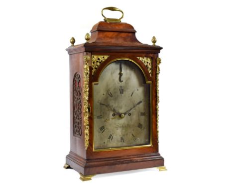 ~ A George III Mahogany Striking Table Clock, signed John Meek, London, circa 1790, inverted bell top pediment with carrying 