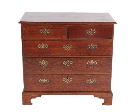 A George III Oak and Pine-Lined Chest of Drawers, 3rd quarter 18th century, the moulded top above two short and three long gr