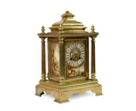 &lt;&gt; A Brass and Porcelain Mounted Striking Mantel Clock, circa 1890, caddy pediment with four turned finials, porcelain 