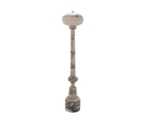 A Large Alabaster Floor-Standing Standard Lamp, circa 1930, the circular shade carved with acanthus leaves, on a column suppo