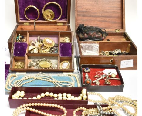 A LARGE COLLECTION OF COSTUME JEWELLERY  contained in two wooden jewellery boxes to include rings, brooches, necklaces and se