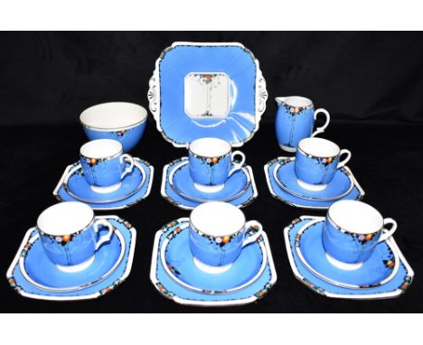 A SHELLEY 'LOMOND' SHAPE SIX SETTING TEA/COFFEE SERVICE decorated with fruit and leaves on a blue ground, comprising six cups