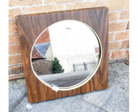 A 1970s FAUX WOOD FRAMED CIRCULAR WALL MIRROR/LAMP  50cm sqaure overall, paper label to back for 'CREATORS INC.' Condition Re