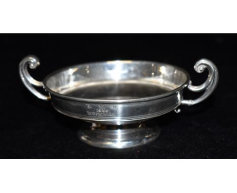 A SMALL SILVER TWIN HANDLED TROPHY  engraved T.V.H., 1939, WORKMAN, the initials are for Tim Victor Hyde, Jockey and Workman 