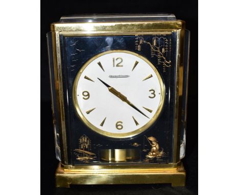 A JAEGER LECOULTRE 'MARINA' ATMOS CLOCK  the 4.25' white dial with Arabic quarter hour markers and baton numerals, the lucite