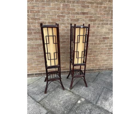A PAIR OF BAMBOO FRAMED TWO LIGHT FLOOR LAMPS  with cylindrical shades, 146cm high Condition Report : both in good condition 