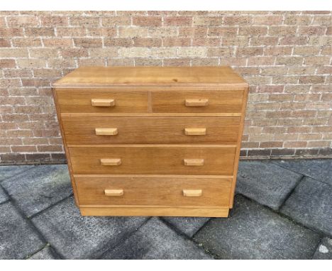 A LIGHT OAK CHEST OF TWO SHORT AND THREE LONG DRAWERS  in the manner of Heals/Gordon Russell, with Air Ministry stamp to back