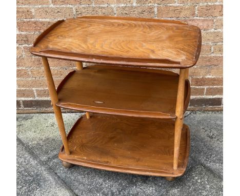A LIGHT ERCOL THREE TIER TROLLEY  model '458', 71cm x 45cm, 77cm high. Condition Report : rather tired, damage to galllery an