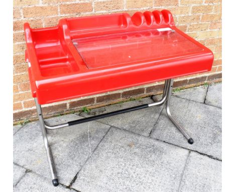 VITTORIO PARIGI AND NANI PRINA FOR MOLTENI &amp; CO.: An Italian red plastic 'Orix' desk, designed 1970, moulded plastic on t