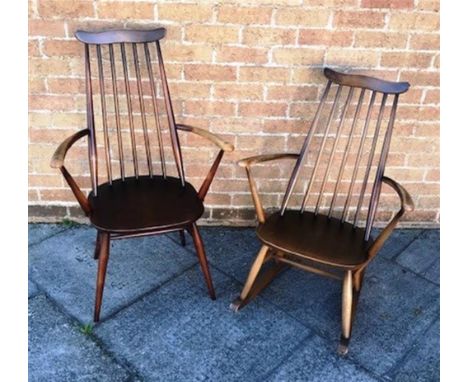 AN ERCOL 'GOLDSMITH' STICKBACK ROCKING CHAIR  and a similar armchair (2) Condition Report : light wear and tear, and a few sc
