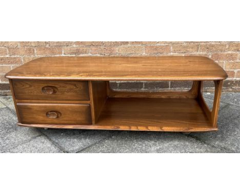 AN ERCOL ELM 'MINERVA' RECTANGULAR COFFEE TABLE MODEL 844  with two drawers and undertier, on castors, width 125cm x 53cm, 39