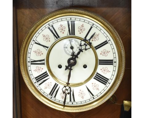 A CONTINENTAL WALNUT CASED TWIN WEIGHT REGULATOR TYPE WALL CLOCK  the 8-day twin train movement stamped 'RSM' for R.M Schneck