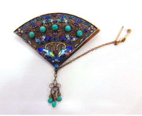 A CHINESE TURQUOISE AND ENAMEL BROOCH circa 1930, of fan shape with butterfly motifs, with drops below, 6.9cm across 